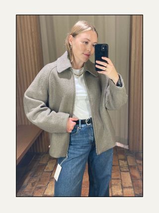 Woman wears wool-blend jacket with pockets