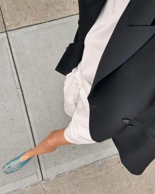 Courtney Grow wearing jelly shoes.